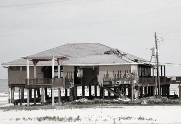 Wind damage - spray foam can help prevent uplift to Cape Coral roofs